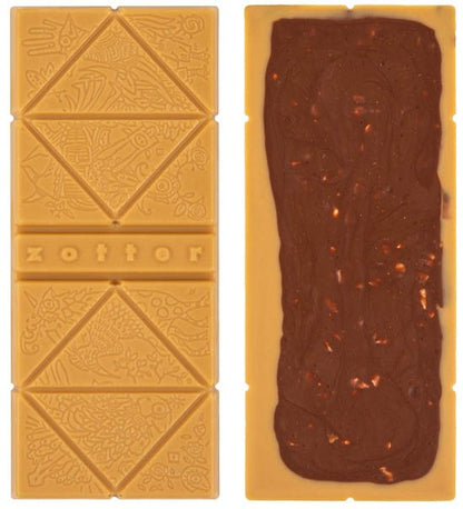 Bio & Fair Nussknacker baton de caramel cu unt de cacao și nuga de arahide cu bucăți de arahide, 70g Zotter